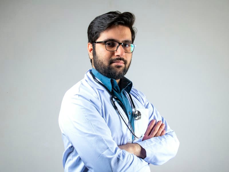Doctor in a white coat with a stethoscope